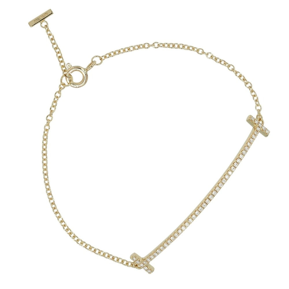 TIFFANY & CO. 18k Gold Diamond Charm Bracelet